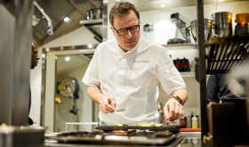 Chef Christophe Hardiquest in the kitchen of La Mère Germaine