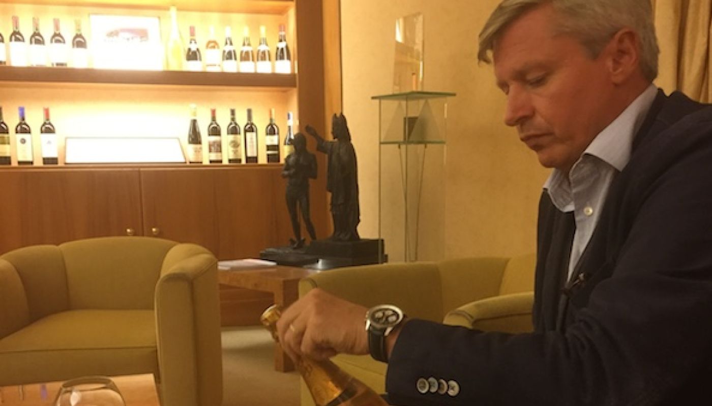 Jean-Baptiste Lecaillon opening a bottle of Cristal 2007