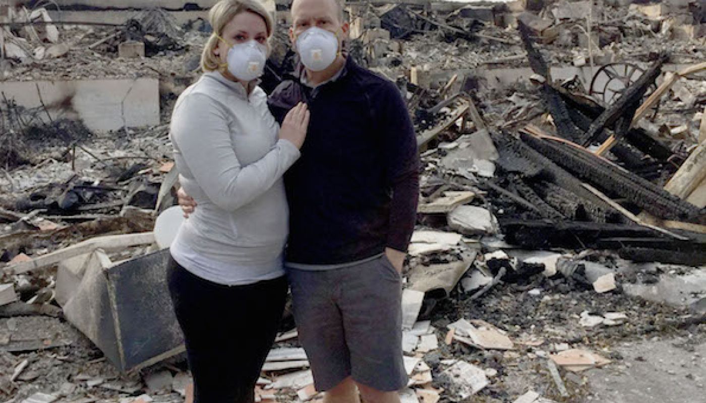 Nick and Katie and remains of their home