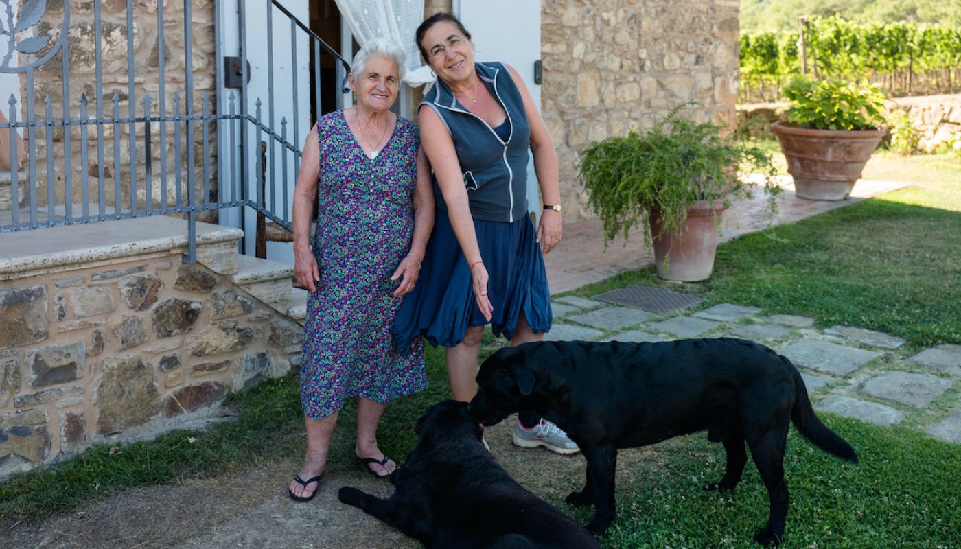 Laura Brunelli of Montalcino and her dog Orso, each with their mother