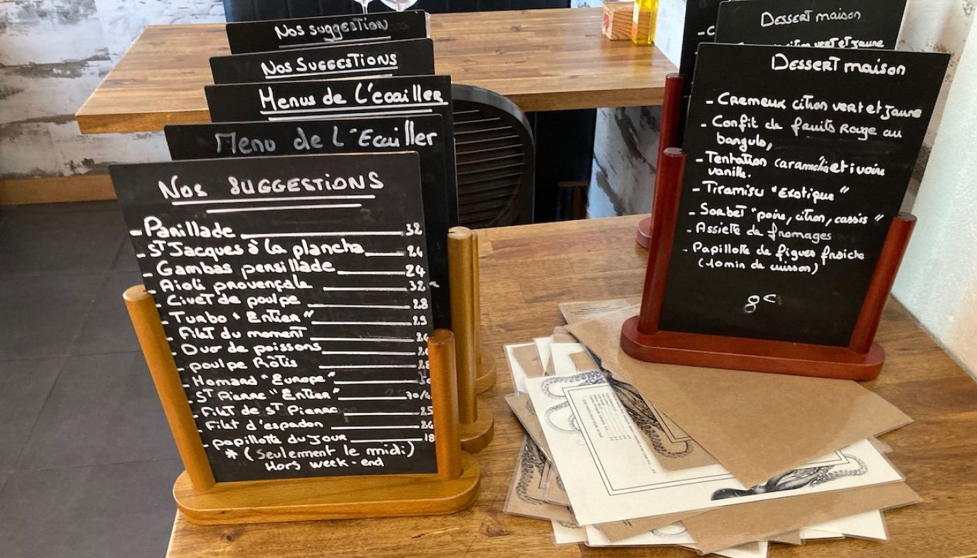 Restaurant menus written on mini blackboards