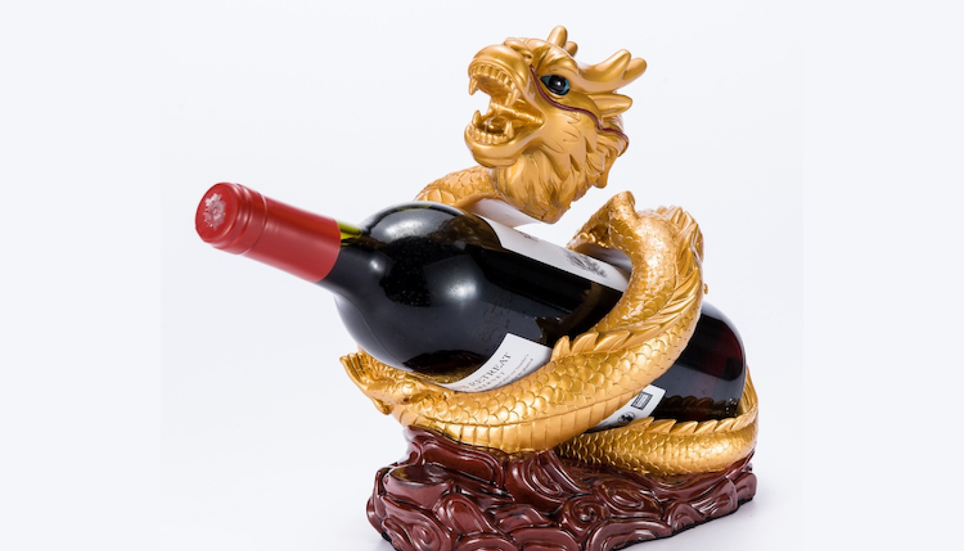 Wine bottle in dragon holder