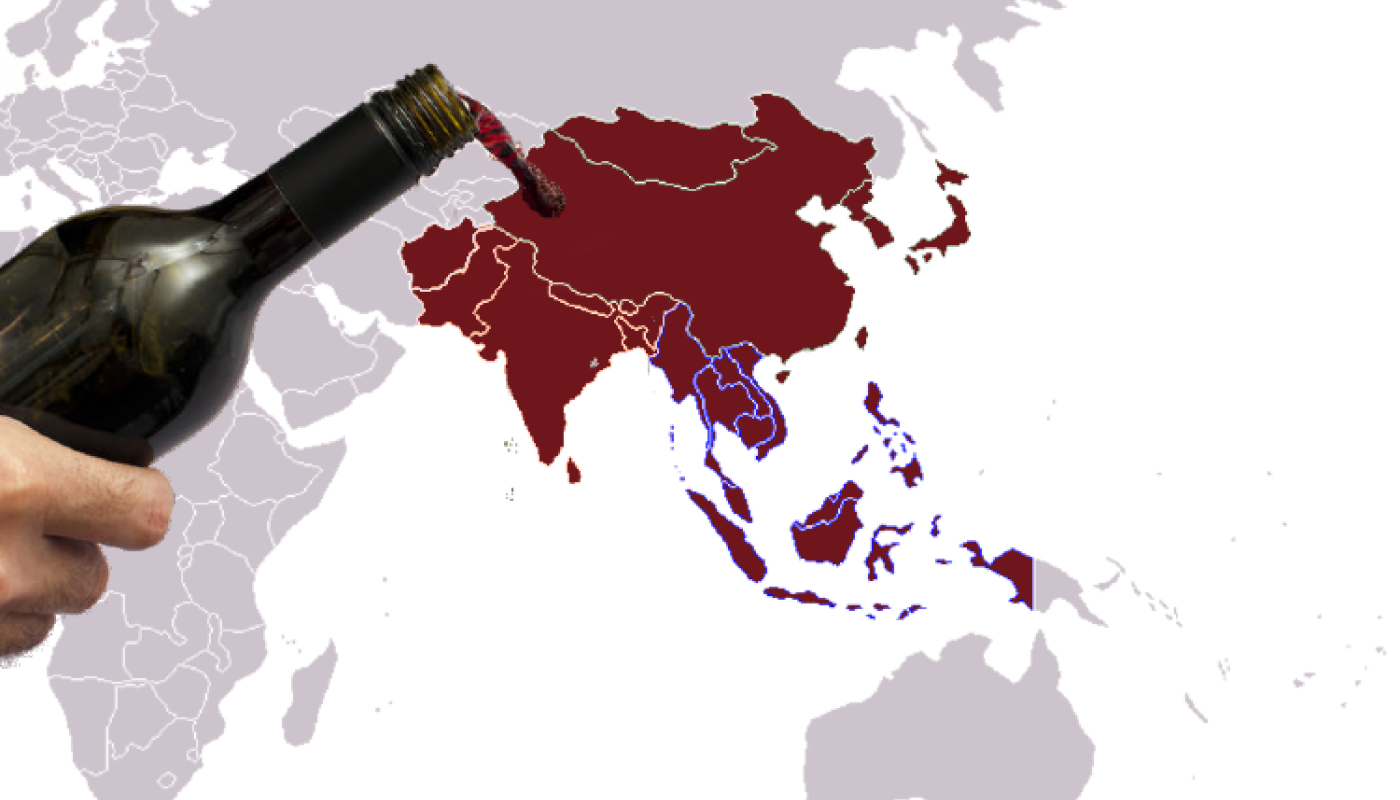 wine pouring onto map of Eastern World