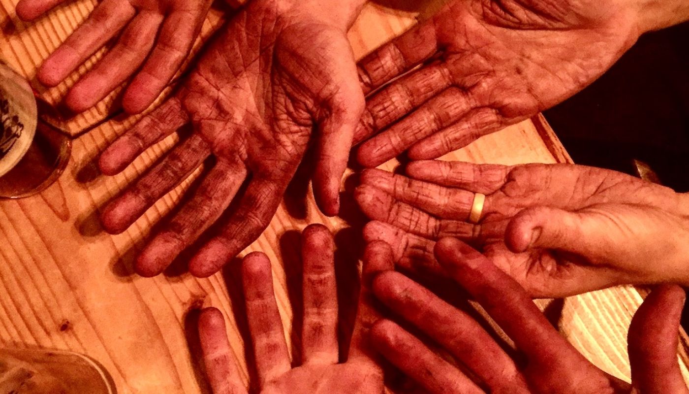 Oregon winery workers' hands