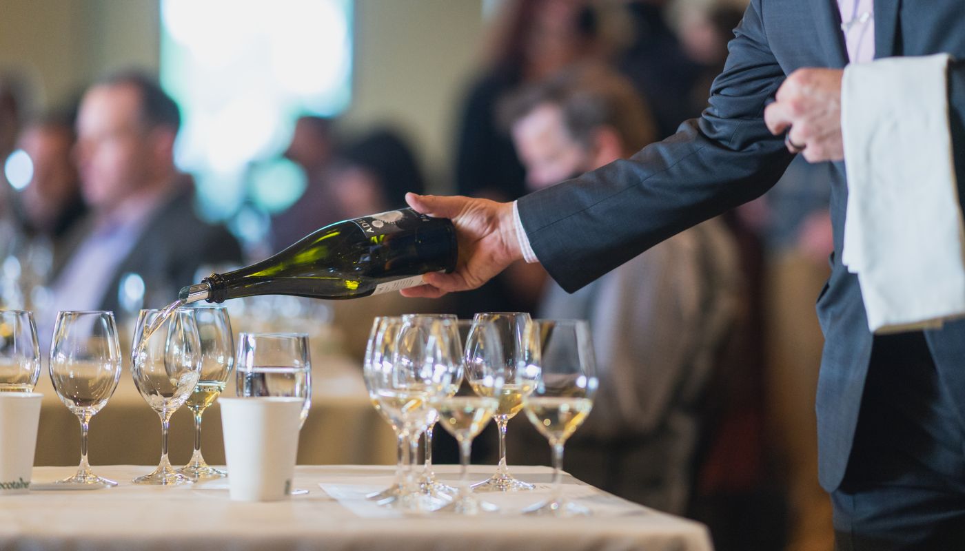 pouring wine at the Oregon Chardonnay Celebration 2022 photo credit Josh Chang