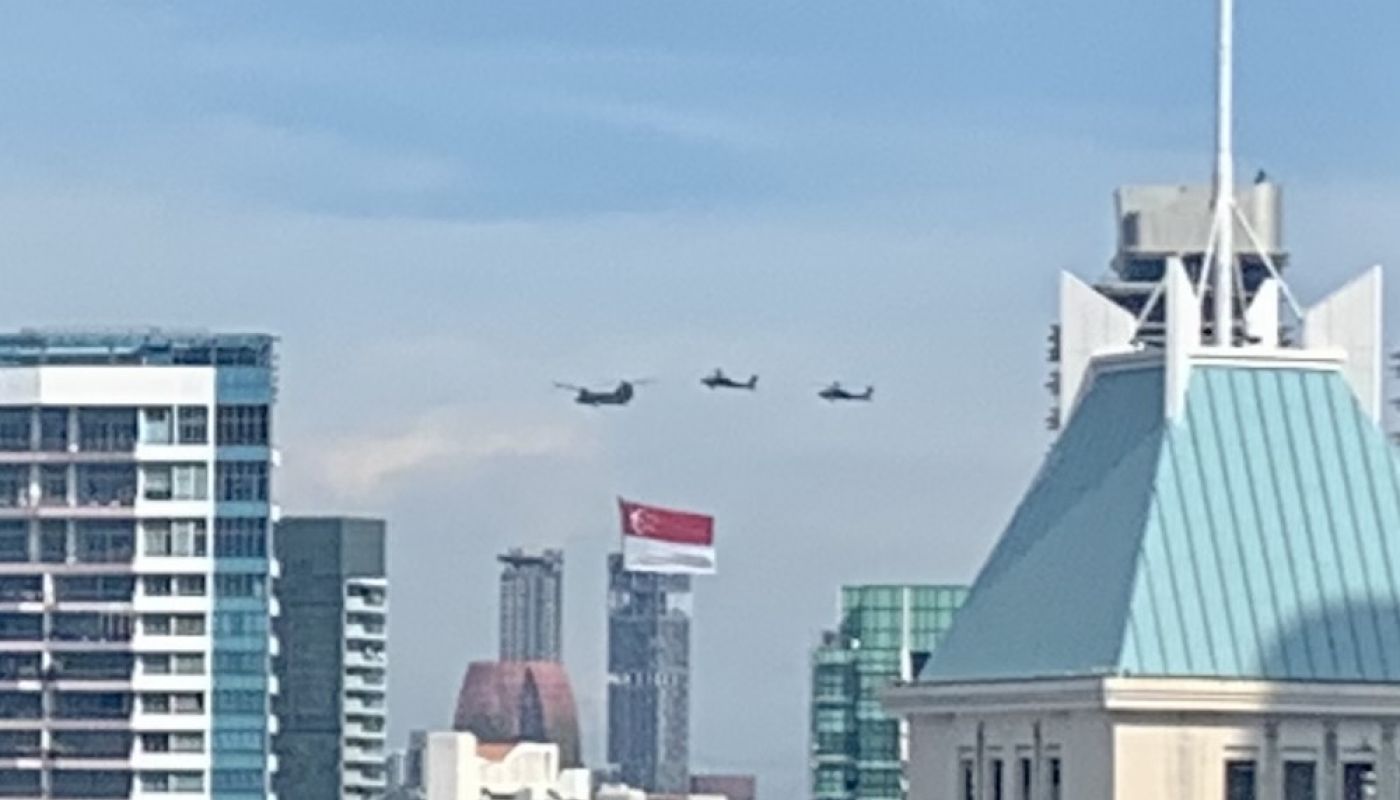 Singapore Flag flying from helicopter