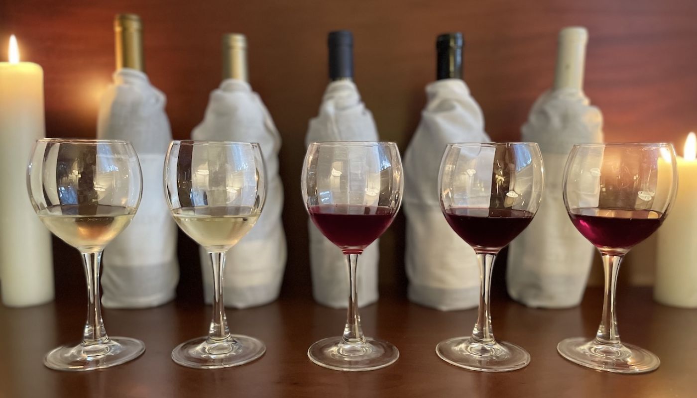 Glasses arrayed for a blind tasting