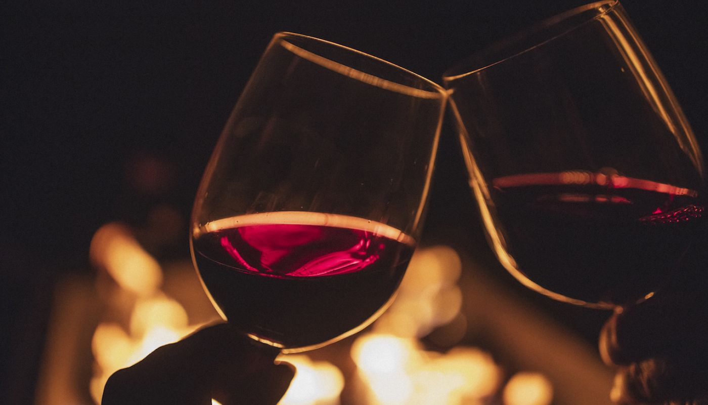 gettyimages-983506874 wine glasses and fire