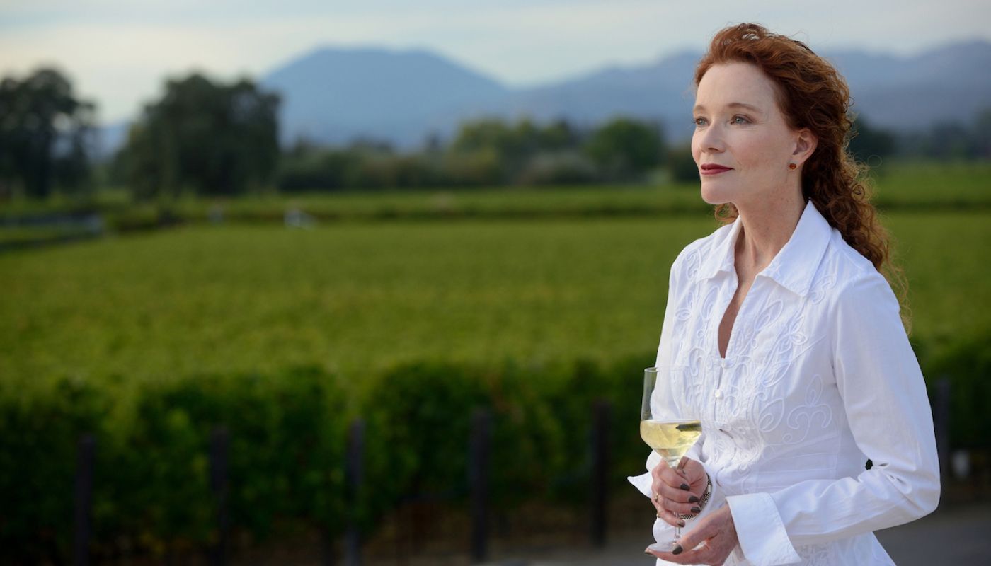 The Wine Bible - Karen MacNeil overlooking vineyard