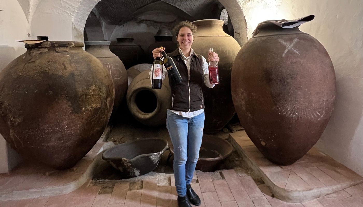 Teresa Caeiro holds a bottles of her NaTalha and a Ferrapo and a palhete or petroleiro wine (a blend of red and white grapes) she makes with her grandfather at the Gerações de Talha (Generations of Talha) winery in Vila de Frades, Alentejo, Portugal