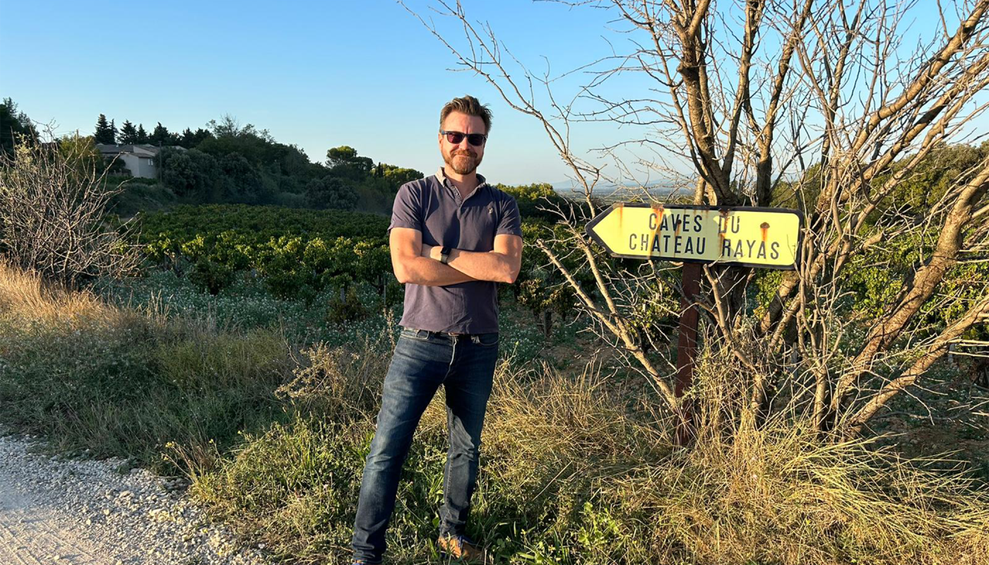 Alistair Cooper by the sign to Chateau Rayas