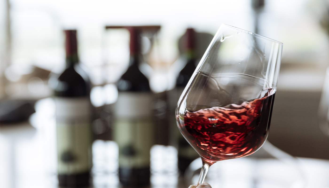 jancis Robinson x Richard Brendon glassware with red wine being swirled in it.