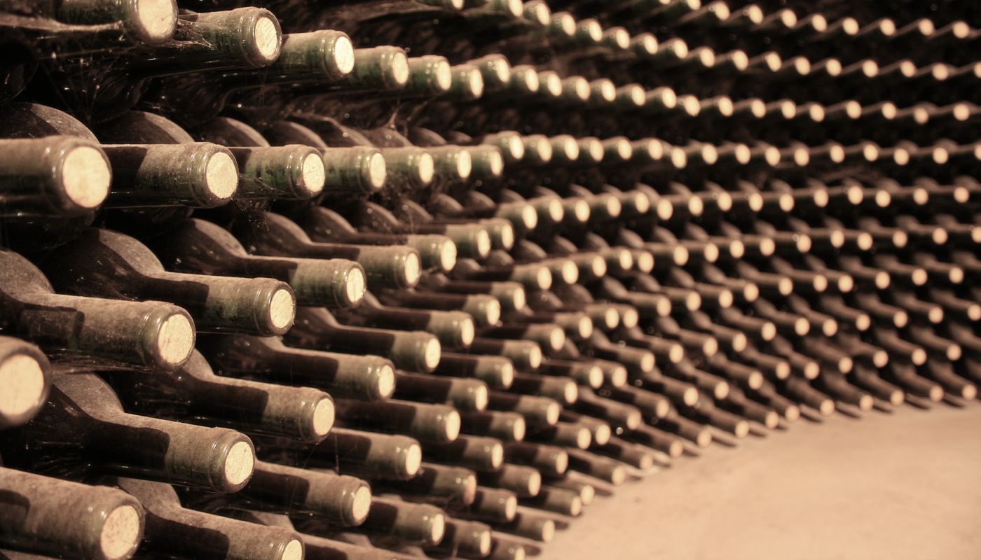 cellar of old bottles of Rioja from GettyImages-ManuelVelasco