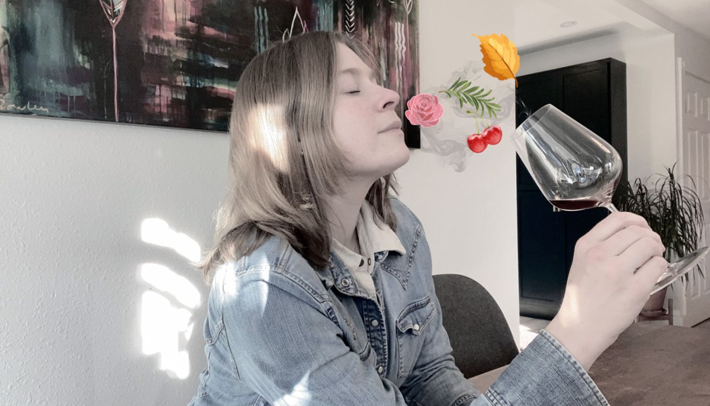 Sam smelling a glass of wine.jpg