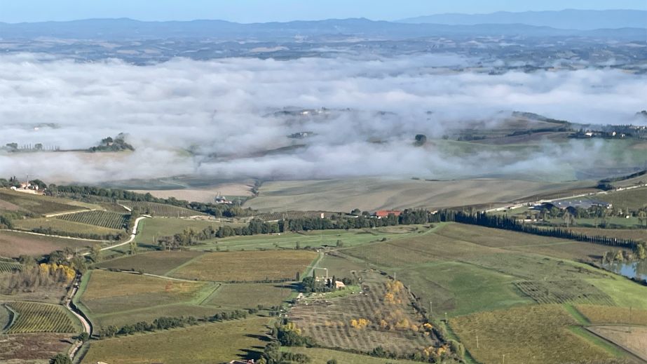 Morning fog over Montalcino by Walter Speller