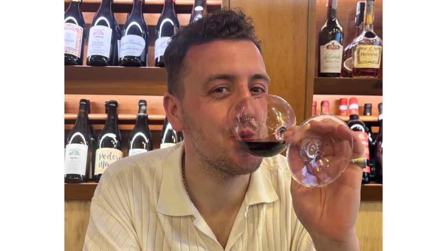 the author drinking said wine in Sicily