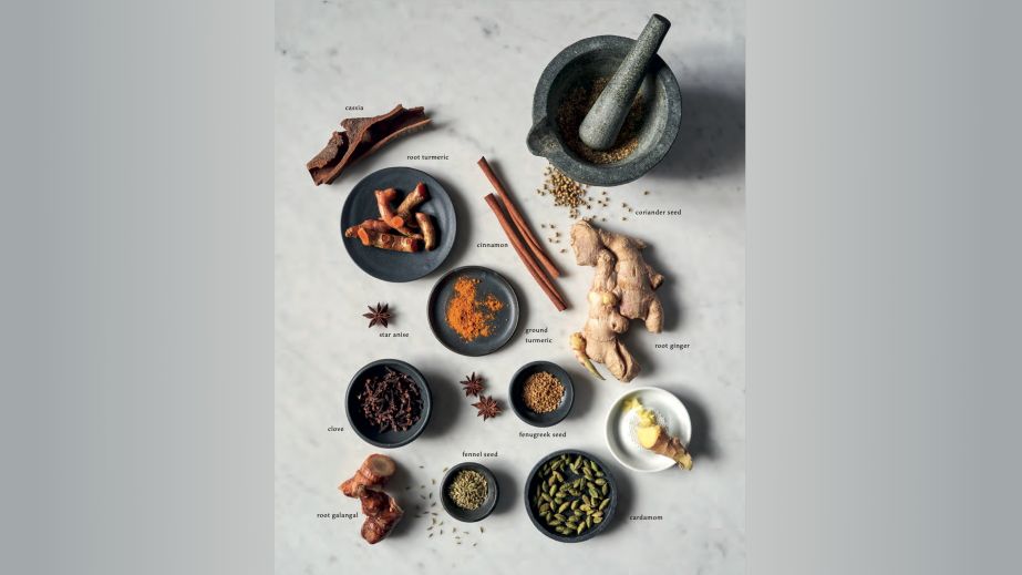 A collection of aromatic spices on a marble table