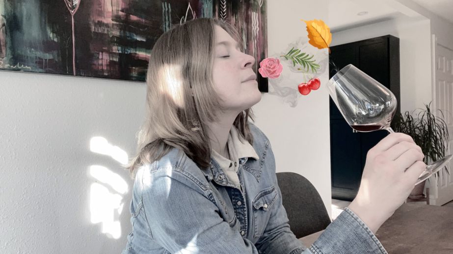 Sam smelling a glass of wine.jpg