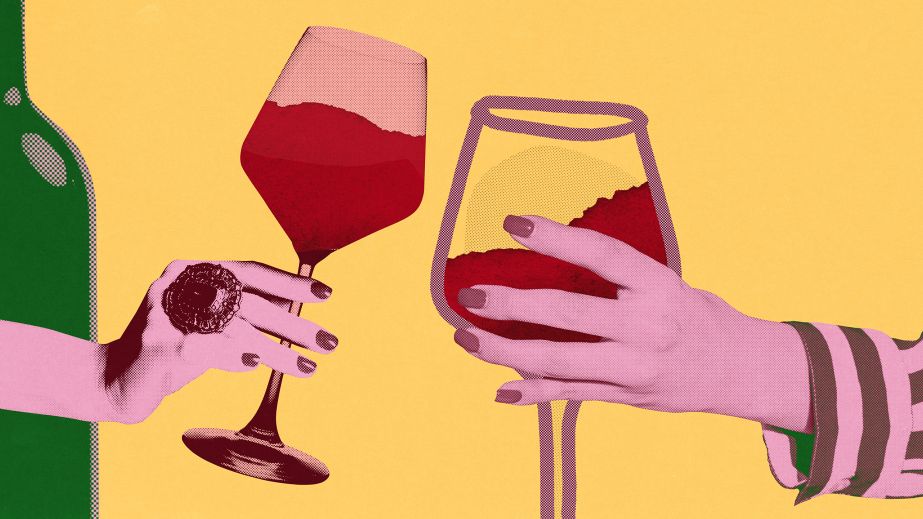 female urban hands each holding a glass of wine - Shutterstock