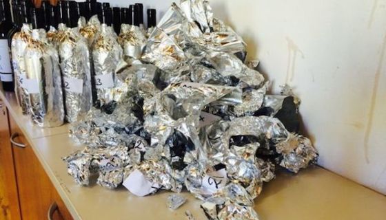 discarded bottle wrappers - aftermath of blind tasting Brunello di Montalcino