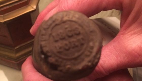 hands of Paul Symington holding 1868 port