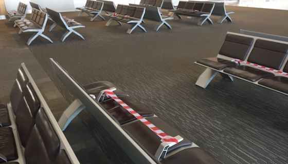 Empty airport with social distancing measures