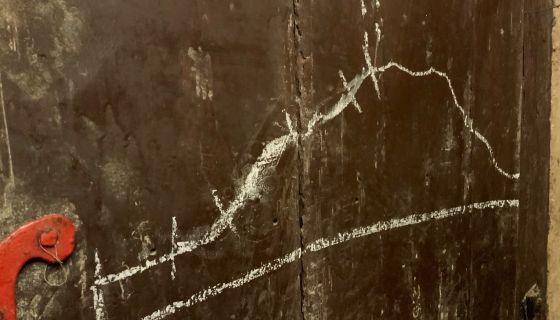 Kolonics - the hill of Somlo chalked on the cellar door