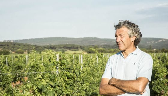 Gerard Bertrand in vineyard - photo by Marie Ormieres