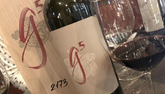 Bottle and glass of G5