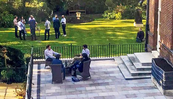 A drinks party in a garden