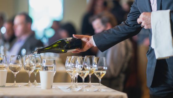 pouring wine at the Oregon Chardonnay Celebration 2022 photo credit Josh Chang