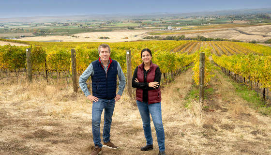 Owner and CEO of Valdemar Estates, Jesús Martínez Bujanda, and winemaker and viticulturist, Devyani Gupta, stand in their newly acquired V2 vineyard, purchased from Betz Family Winery in November 2022. Photo courtesy of Valdemar Family Estates.