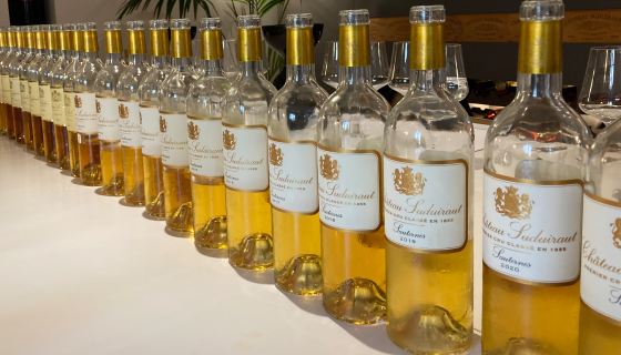 Suduiraut vertical tasting lineup of bottles