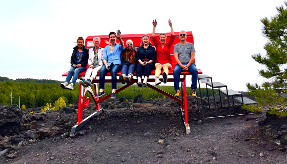 Etna - everyone on a giant red bench
