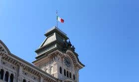 Tower in Trieste with Italian flag