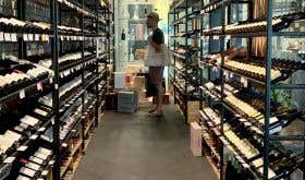 Richard Hemming choosing wine in Singapore