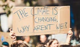 Protest placard - the climate is changing why aren't we?
