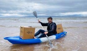 Robin Davies of Swig in kayak off the coast of Ayrshire