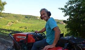 Gaetano Tamellini on a tractor in his Soave vineyards