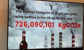 Glass bottle carbon emission graphic at IMW HQ