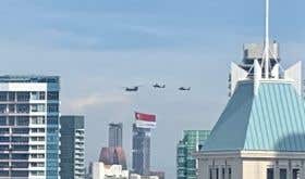Singapore Flag flying from helicopter
