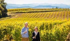 Jan and Caryl Panman in their Rives Blanques vineyards, the mountain behind them