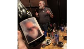 Caption: A tasting moment during the NYC blind wine dinner where the author’s Grenache was revealed.  Photo credit: Peter Brush