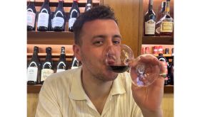 the author drinking said wine in Sicily