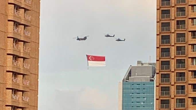 Singapore flag flown by helicopters