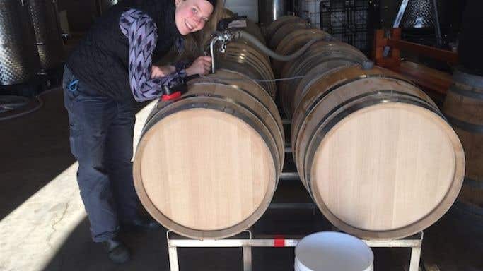 Samantha Cole-Johnson filling barrels in the Willamette Valley, 2019