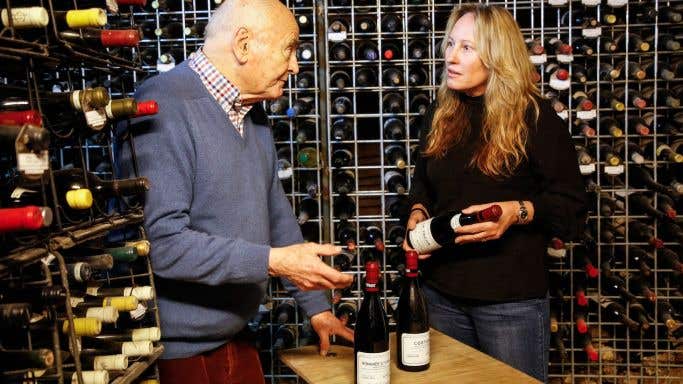 James Halliday and Tamara Grischy of Langton's in his wine cellar