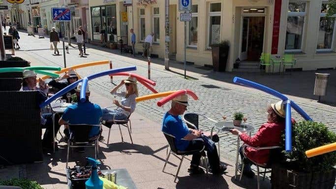Pool noodle hats in Cafe Rothe in Schwerin, Germany