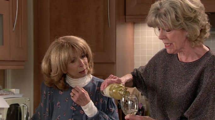 Audrey pours Gail some wine on Coronation Street