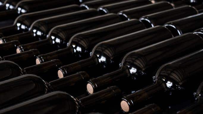 Black wine bottles binned